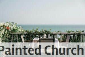 white table and chairs on a sunny day